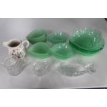 A tray of coloured green glass dishes etc