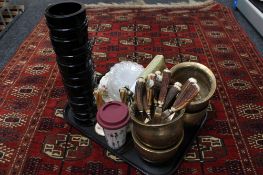 A tray of large glass vase, china plates, brass pots,