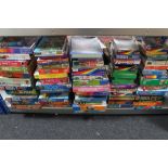 A large quantity of jigsaw puzzles