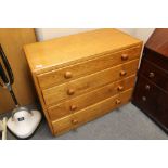 An oak four drawer chest