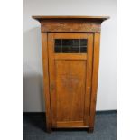 A nineteenth century oak side cabinet