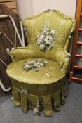 A mid century green floral striped bedroom chair