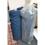 Three large rolls of material