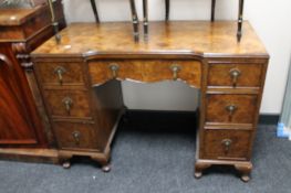 An early 20th century walnut dressing table