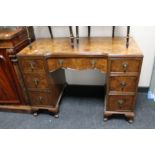 An early 20th century walnut dressing table