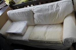 An Ikea sofa bed with spare covers