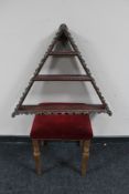 A blonde oak dressing table stool and a painted triangular wall shelf