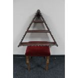 A blonde oak dressing table stool and a painted triangular wall shelf