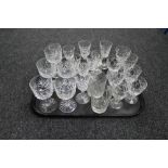 A tray of cut crystal glasses of various design