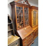 A reproduction mahogany Georgian style bureau bookcase
