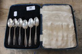 A case of set of five silver teaspoons together with one other teaspoon
