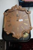 A 20th century continental oak wall clock,