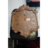 A 20th century continental oak wall clock,