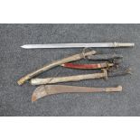 A vintage machete and other bladed weapons,