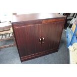 A mahogany double door cabinet