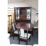 A Stag dining room suite comprising of table,