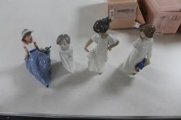 Four Nao figures of children