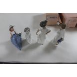 Four Nao figures of children