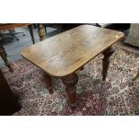 A nineteenth century pine low table