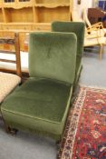 A pair of green dralon chairs