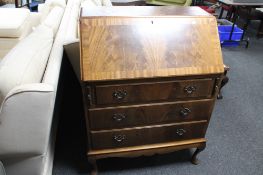 A mid century stained beech six drawer chest