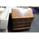 A mid century stained beech six drawer chest