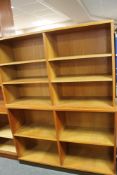 A two section teak bookcase