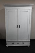 A late nineteenth century painted double door cabinet fitted a drawer CONDITION REPORT: