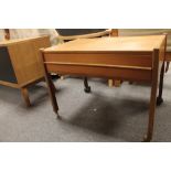 A teak single drawer sewing table