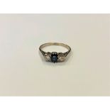 An 18ct gold sapphire and diamond ring