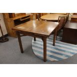An oak pull out dining table
