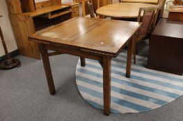 An oak pull out dining table