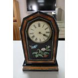 A 19th century lacquered wooden mantel clock