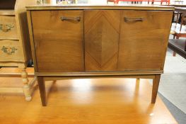 A contemporary beech turn table cabinet