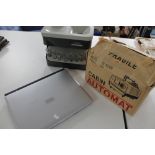 A Fujitsu laptop, coin sorter,