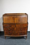 A mid 20th century walnut bureau