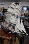 A decorative tall masted model boat