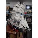 A decorative tall masted model boat