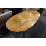 A mid century mahogany coffee table