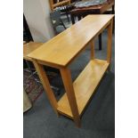 A beech side table together with wicker stand,