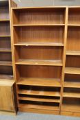 A set of teak bookshelves