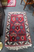 A Caucasian design rug,