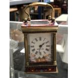 An enamelled French miniature carriage clock