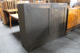 An early twentieth century school cabinet CONDITION REPORT: 124cm wide by 95cm high