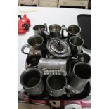 A tray of pewter ware,