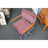 A mid 20th century metal framed swivel chair