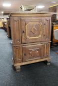 A nineteenth century oak double door cabinet