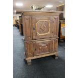 A nineteenth century oak double door cabinet