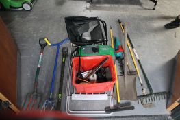 A quantity of garden tools, clothes rack,