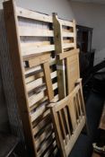 A 5' pine bed frame with interior together with a pair of 3' headboards